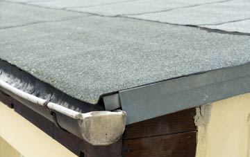 repair or replace Woodland flat roofing?